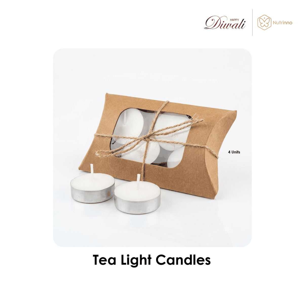 Diwali Premium Gift Hamper featuring four white tea light candles in silver cups, packed in a brown kraft box with a clear window and twine